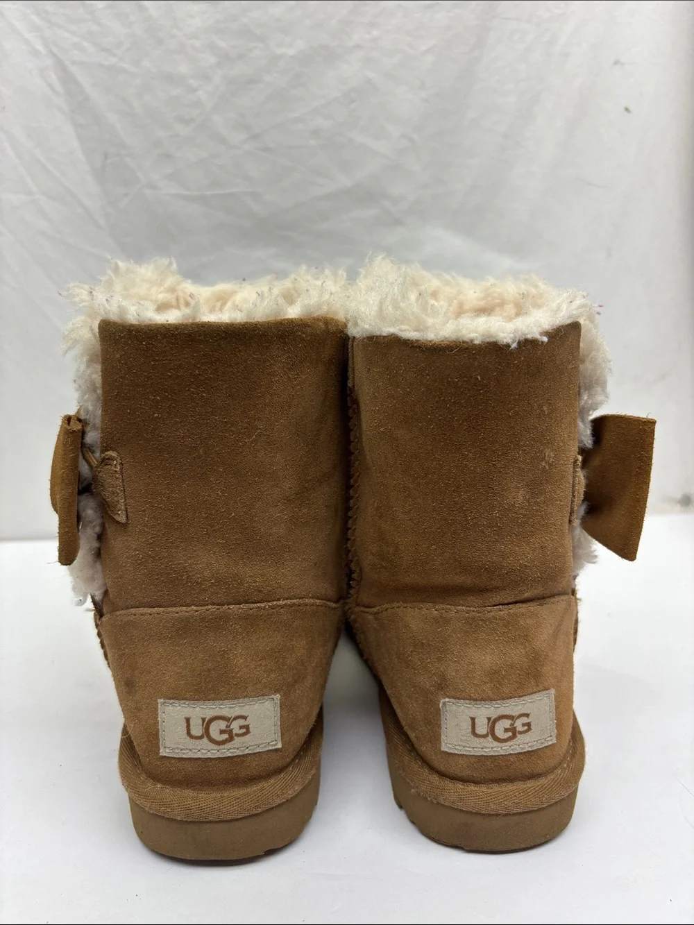 UGG now boots for little girl size 2, box 34